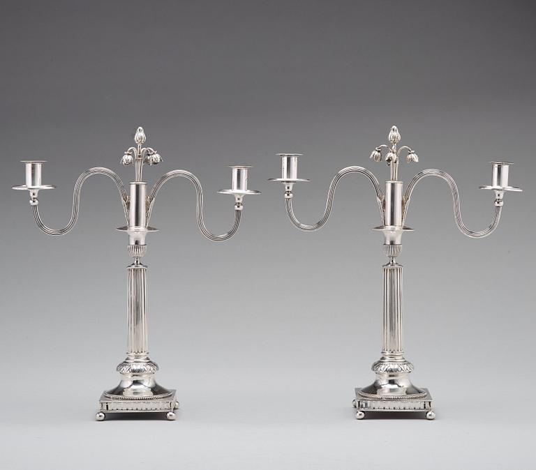 A pair of Swedish 18th century silver candleabra,  mark of Pehr Zethelius, Stockholm 1799.