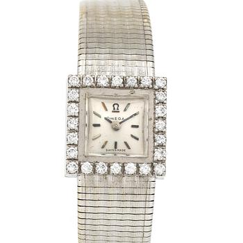 ARMBANDSUR, dam, 18K vitguld med briljantslipade diamanter, tot ca 0,72 ct, Omega. Total vikt ca 41 g.