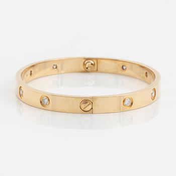 Cartier "Love" armband 18K guld med tio runda briljantslipade diamanter.