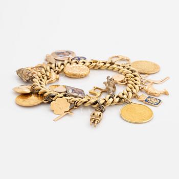 18K gold charm bracelet.