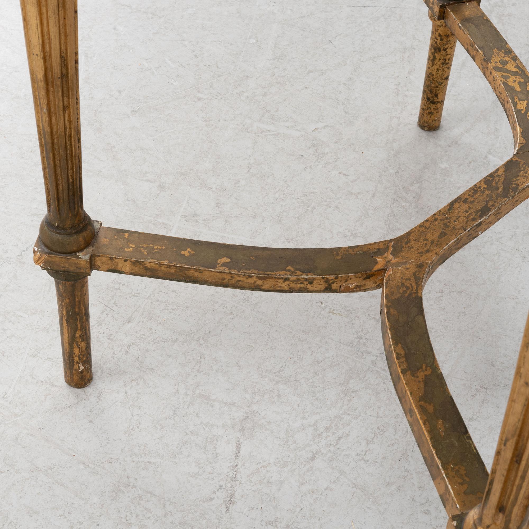 A Gustavian style table, circa 1900.