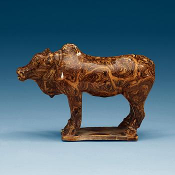 A marbled pottery figure of an ox, presumably Ming dynasty.