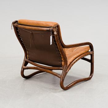 A bamboo and leather armchair, 1970's.
