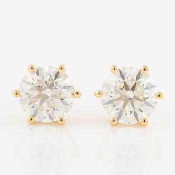 Örhängen 18K guld med briljantslipade diamanter.