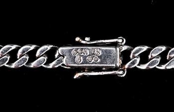 ARMBAND, platina med små diamanter, CG Hallberg, 1937. Ca 15 g.