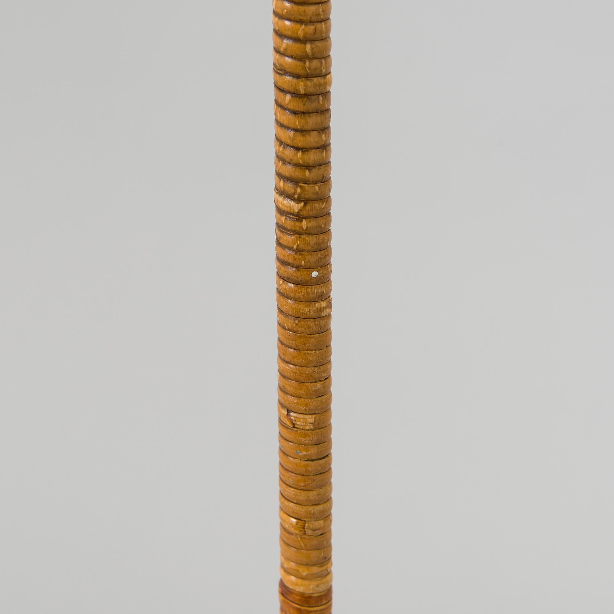 Paavo Tynell, a mid-20th century K10-10 floor lamp for Taito.