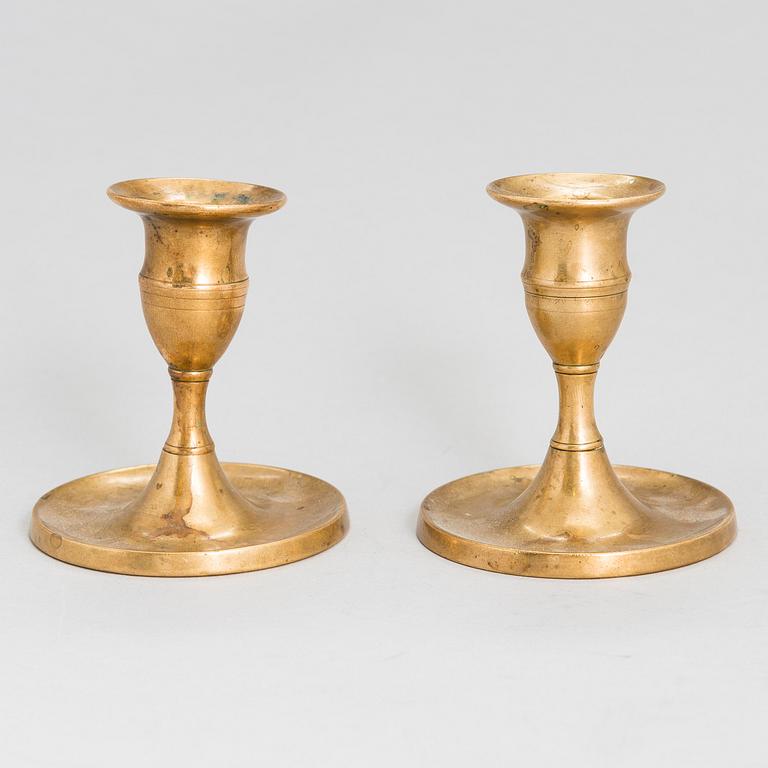 A pair of candlesticks by Leander Helander stamped LH and dated 1854. Kalajoki.