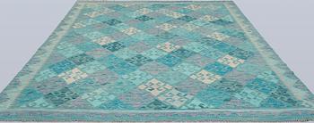 A Kelim carpet, c. 291 x 248 cm.
