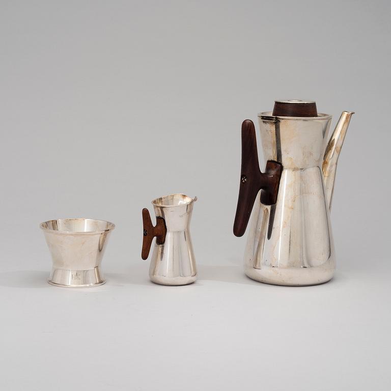 TAPIO WIRKKALA, A COFFEE POT, SUGAR BOWL AND CREAMER. Signed TW. Kultakeskus, Hämeenlinna 1962/-64.