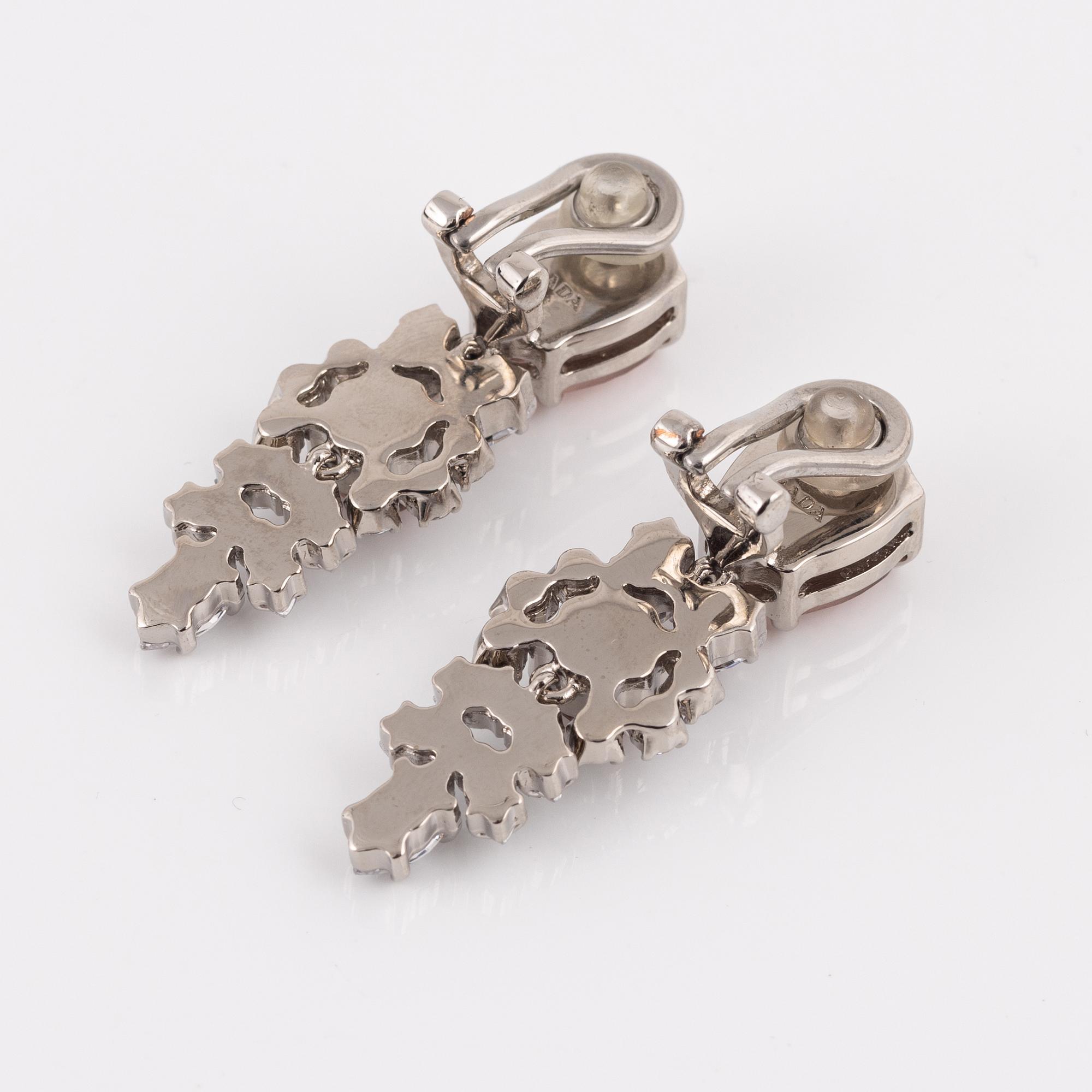 Prada, a pair of clip-on rhinestone and strass earrings.