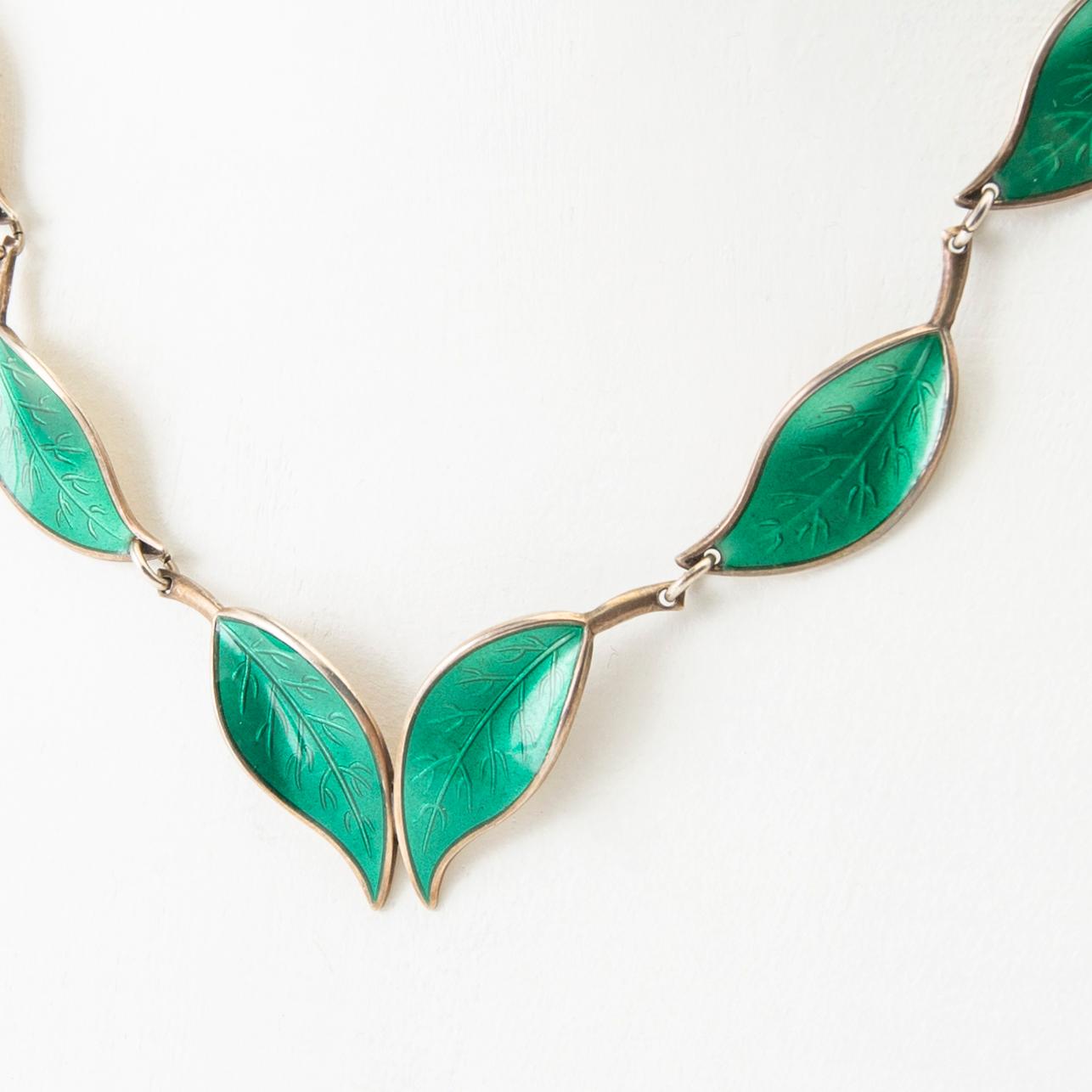 David Andersen jewellery set 4 pieces and necklace in sterling silver and enamel Norway second half of the 20th century. Bukowskis