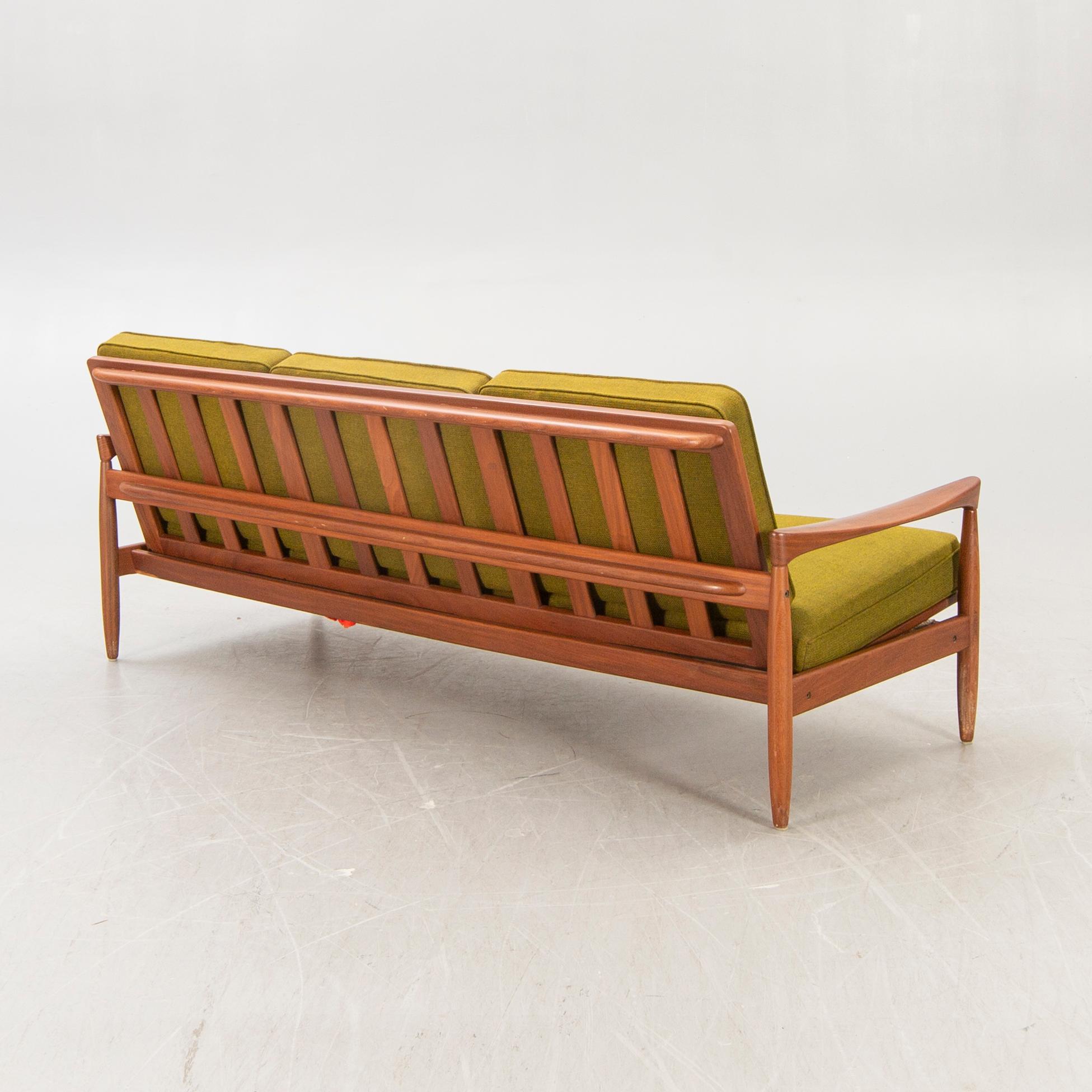 An Erik Wörtz 1962 walnut Kolding sofa for IKEA.