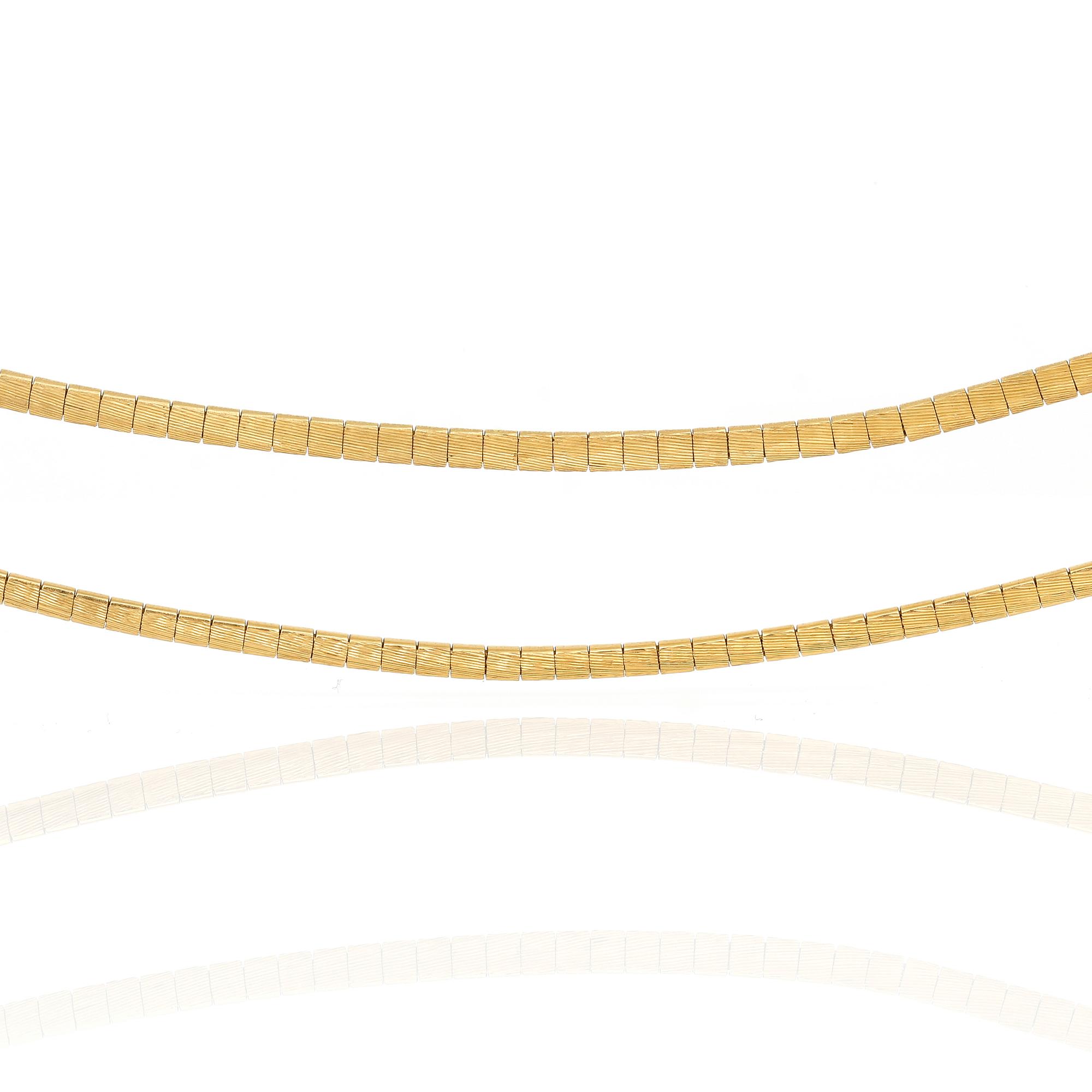 COLLIER, 18k guld, vikt ca 37 gram.