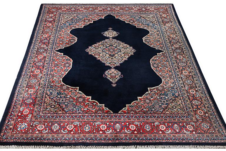 A Moud carpet, c. 310 x 206 cm.