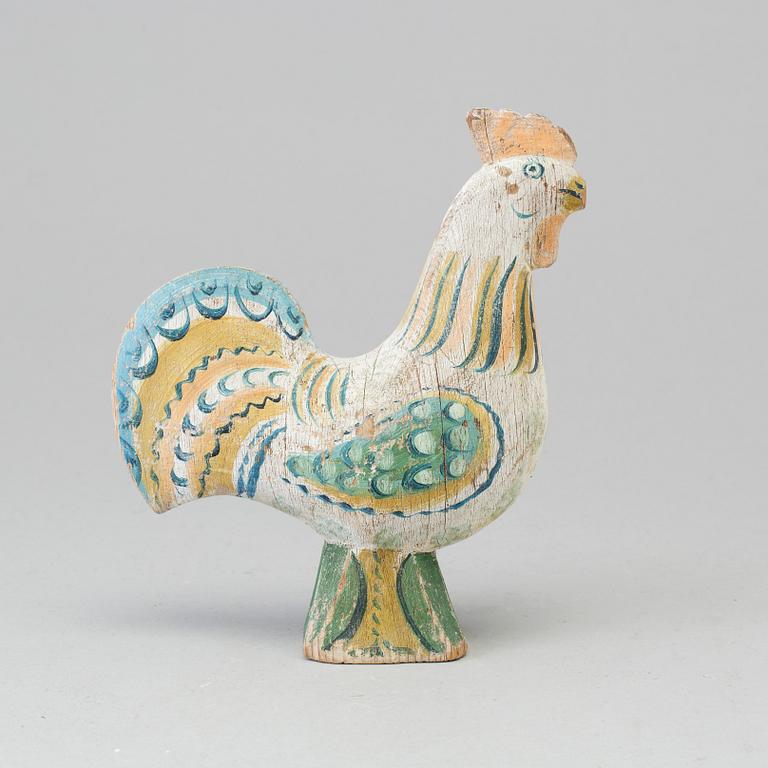 A painted wooden cockerel, 19th/20th century.