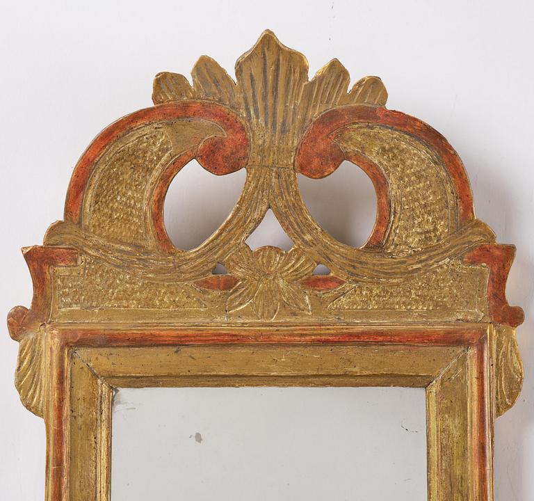 A pair of Gustavian giltwood mirrors by N. Falkengren (master in Jönköping 1776-1813).