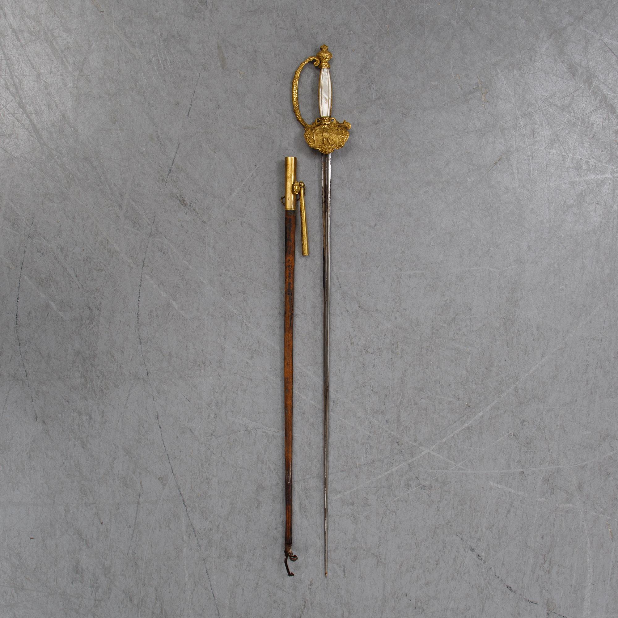 A french small sword with scabbard, early 19th Century.