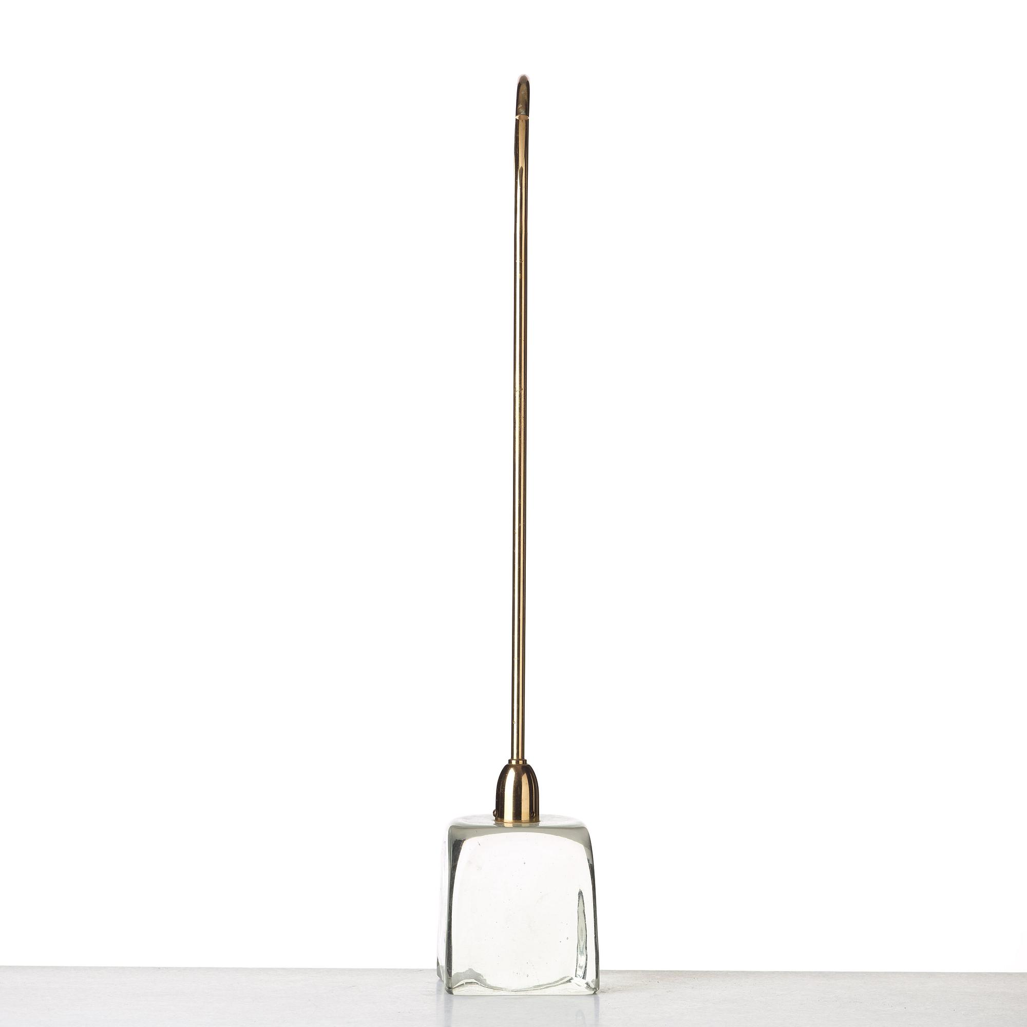 Estrid Ericson, a glass and brass doorstop, Svenskt Tenn, provenance Estrid Ericson.