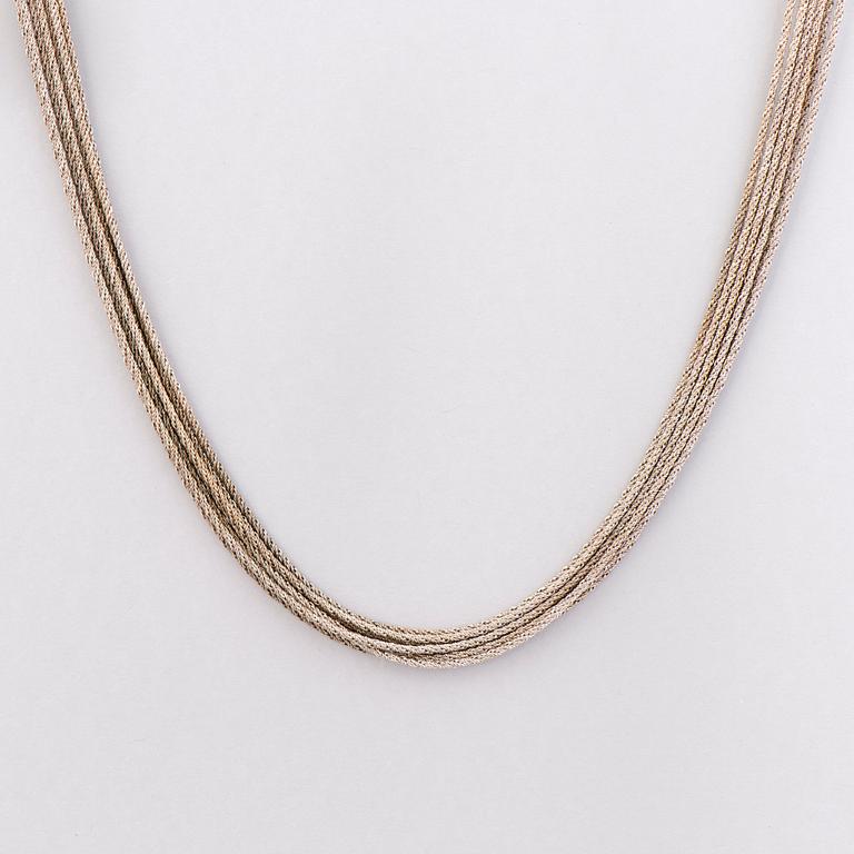 KAULAKORU, 18K valkokultaa. A. Tillander, Helsinki 1973.