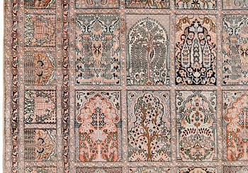 A silk Kashmir carpet, approx. 327 x 243 cm.