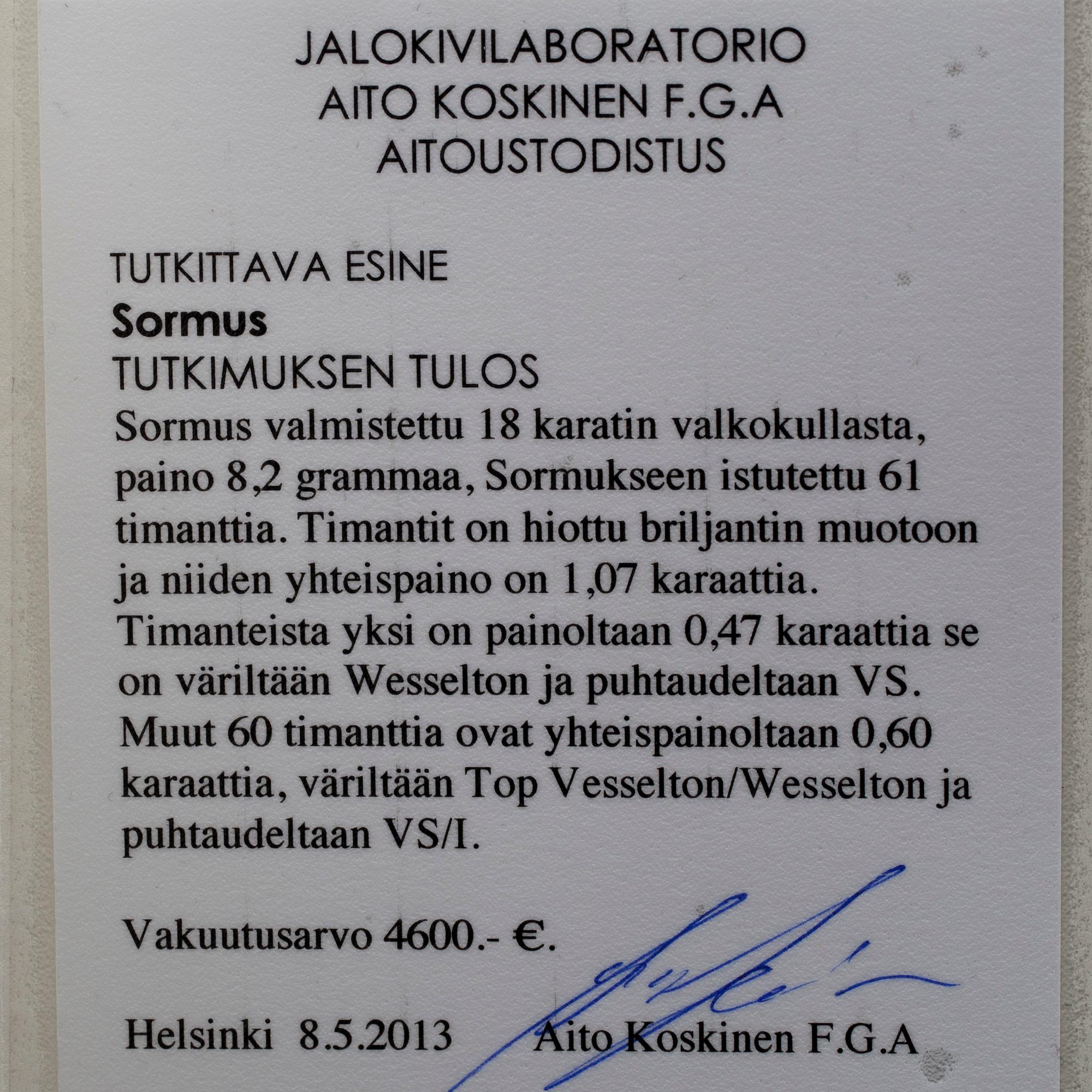 RING, vitguld 18K, briljantslipade diamanter, tot. 1,07 ct, mittsten 0,47 ct. Vikt 8,2 g. Intyg.