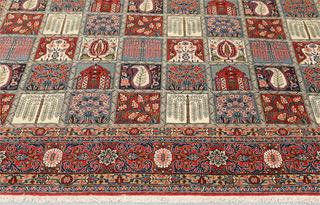 A semi-antique Ghom carpet, approx. 318 x 241 cm.