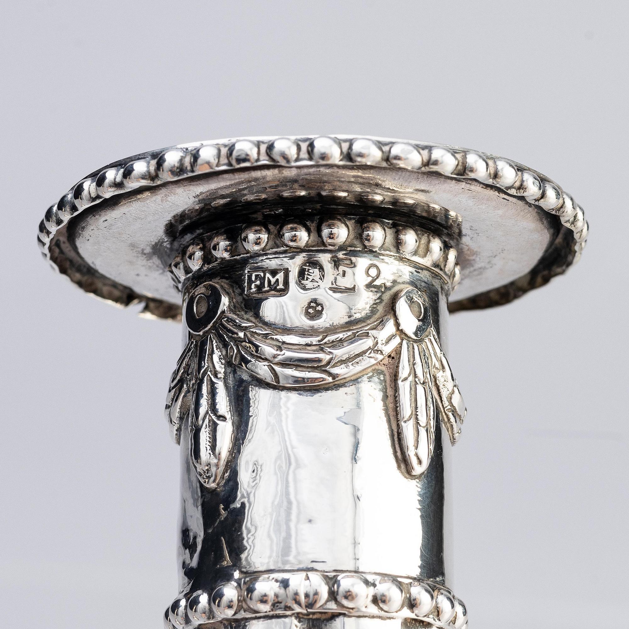 A pair of Swedish 18th century silver candlesticks, marks of Fredric Meyer, Karlshamn 1787.