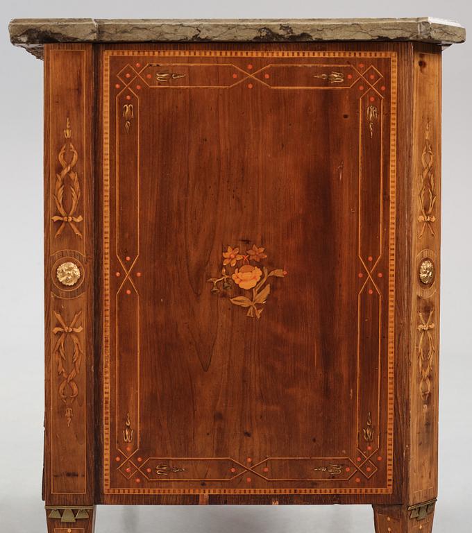 A Gustavian marquetry and ormolu-mounted commode by N. P. Stenström (master in Stockholm 1782 - 90).