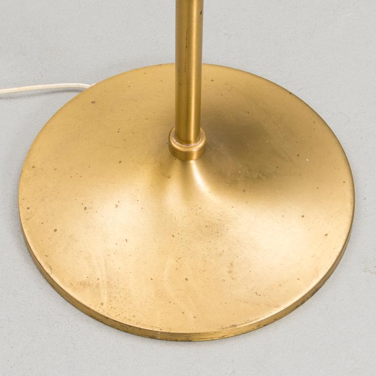 A 1970's floor lamp by Kai Ruokonen for Orno, Finland.