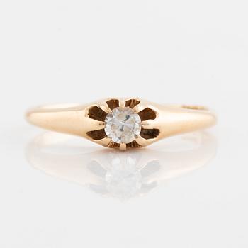 Ring, 18K gold with faceted white stone.