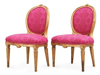 456. A pair of Gustavian late 18th century chairs.