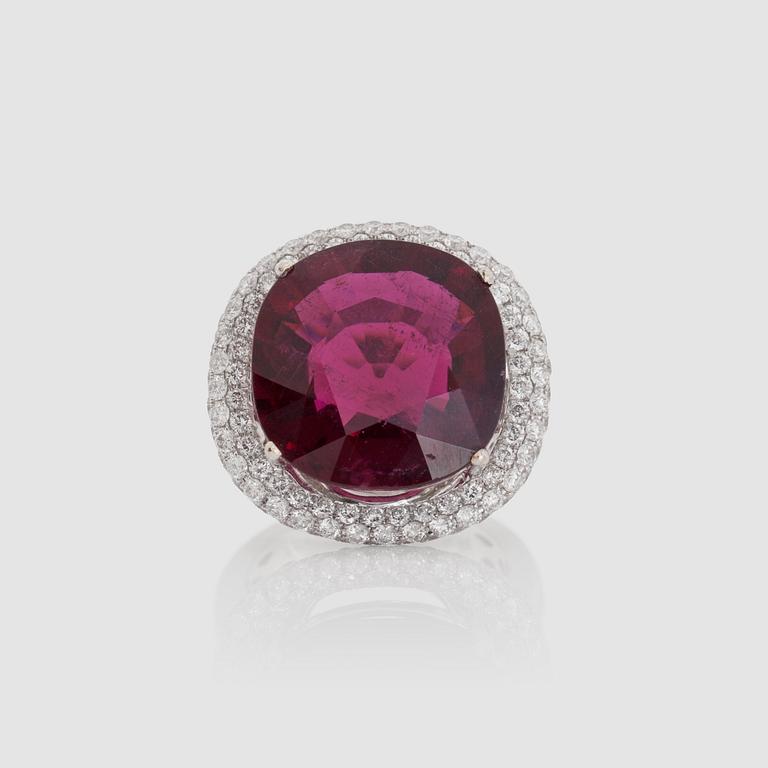 A rubellite, 15.58 cts, and diamond, 1.69 cts, ring.