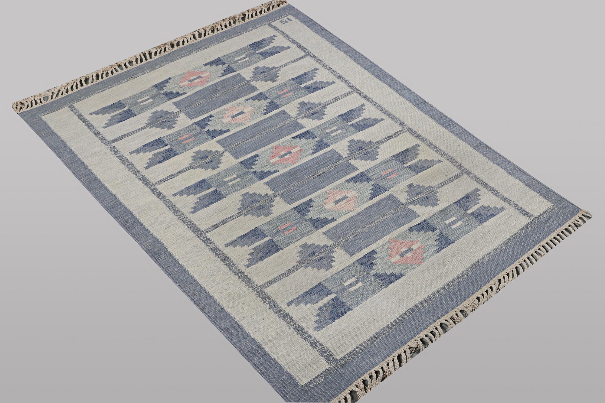 Ingegred Silow, a flat weave carpet, signed IS, ca 197 x 137 cm.