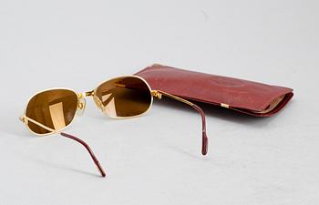 SOLGLASÖGON, Cartier.