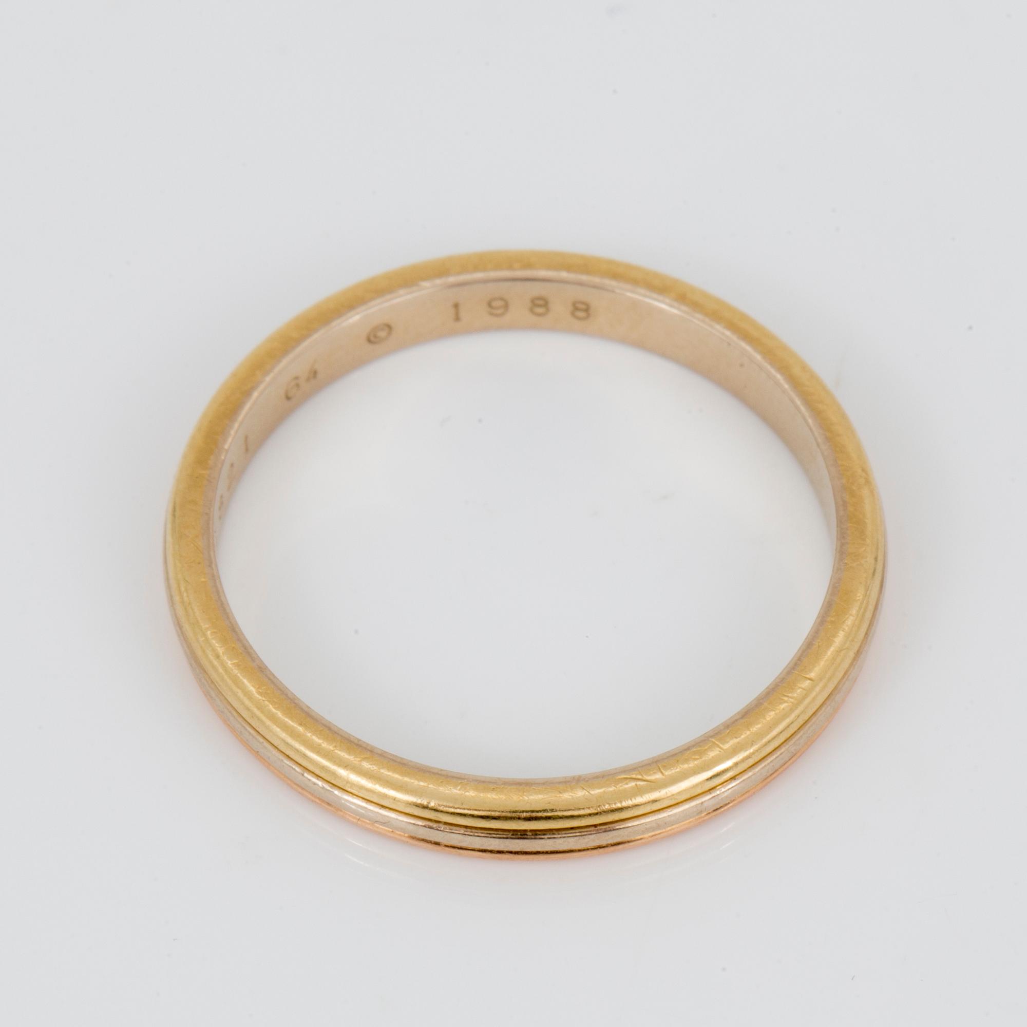 RING, Cartier, trefärgad 18K guld, daterad 1988.