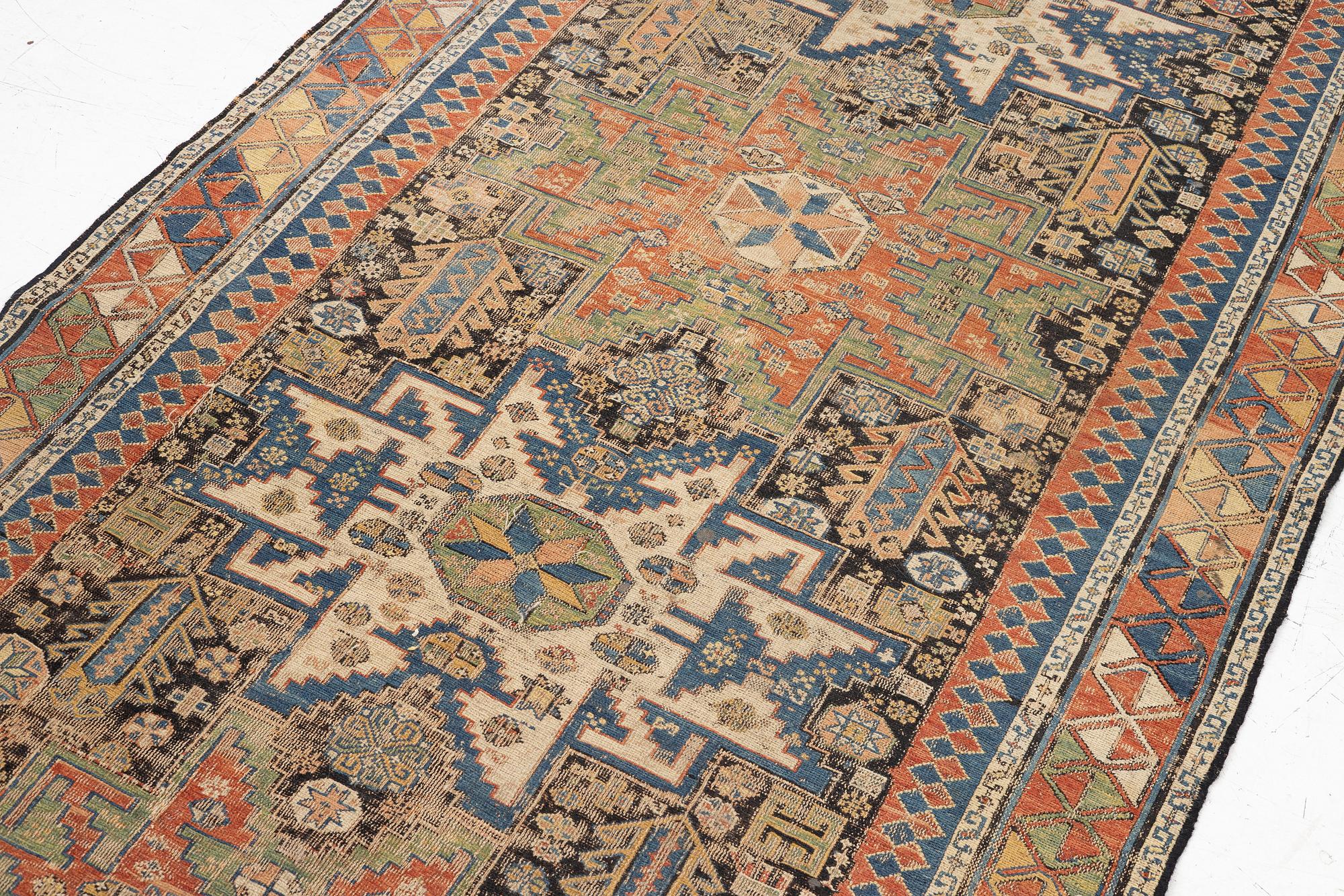 An oriental carpet, c 280 x 130 cm.
