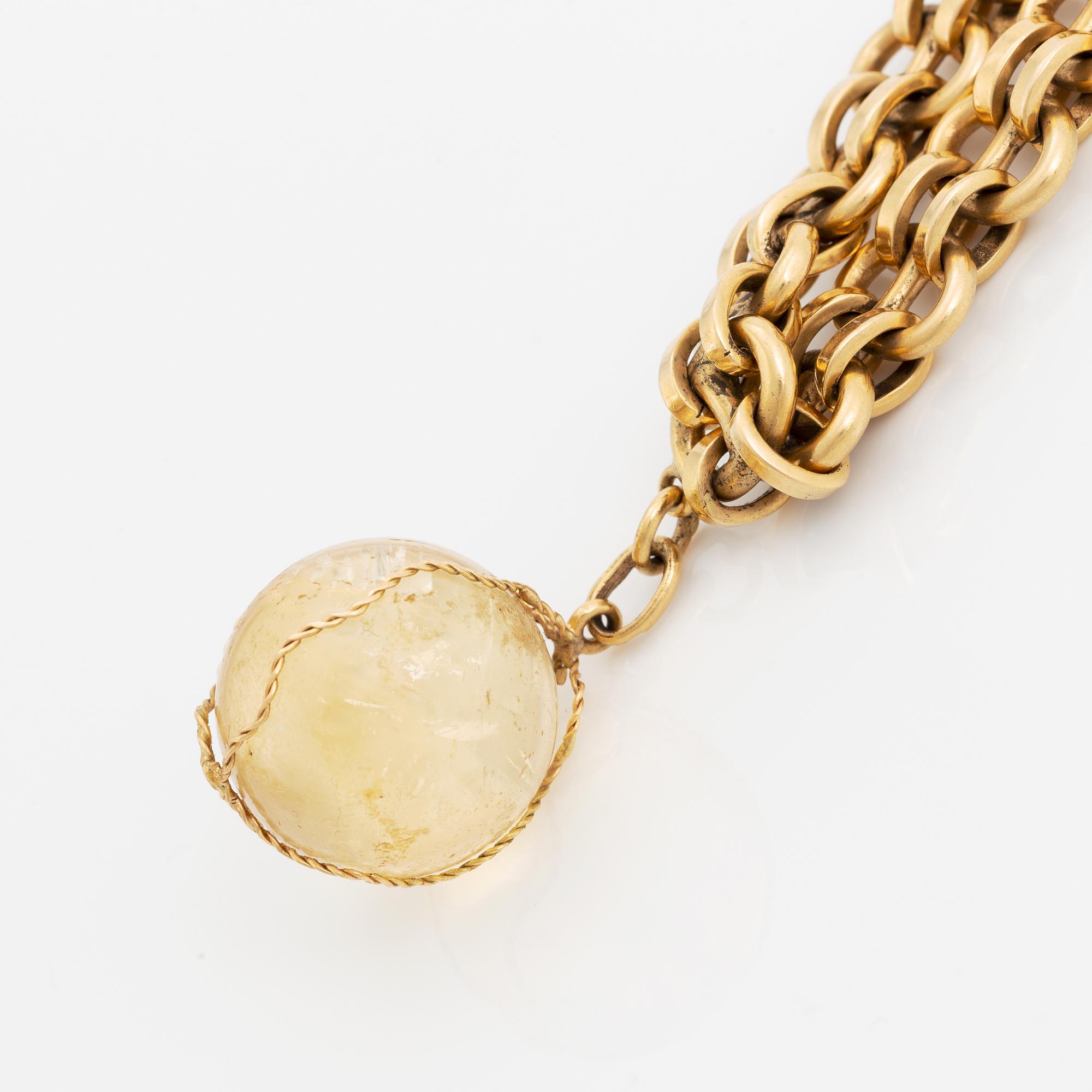 Claës E. Giertta, armband 18K guld med berlock med citrin.