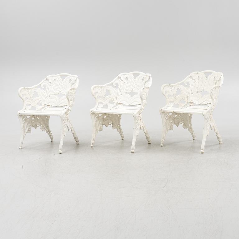 Three painted cast aluminium garden armchairs, second part of the 20th Century.