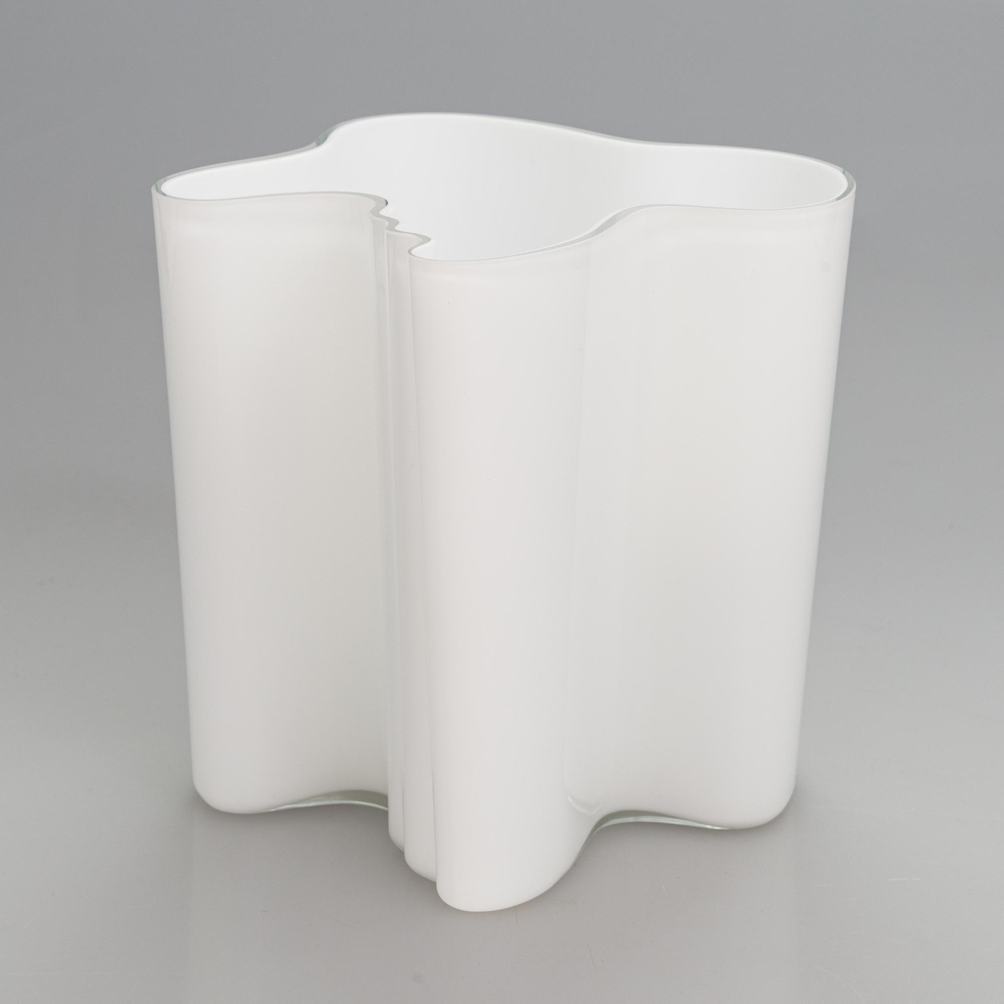 Alvar Aalto, A signed white mould blown glass vase, Iittala, Finland, model 3031.