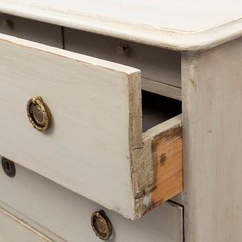 A mid 19th century painted chest of drawers.