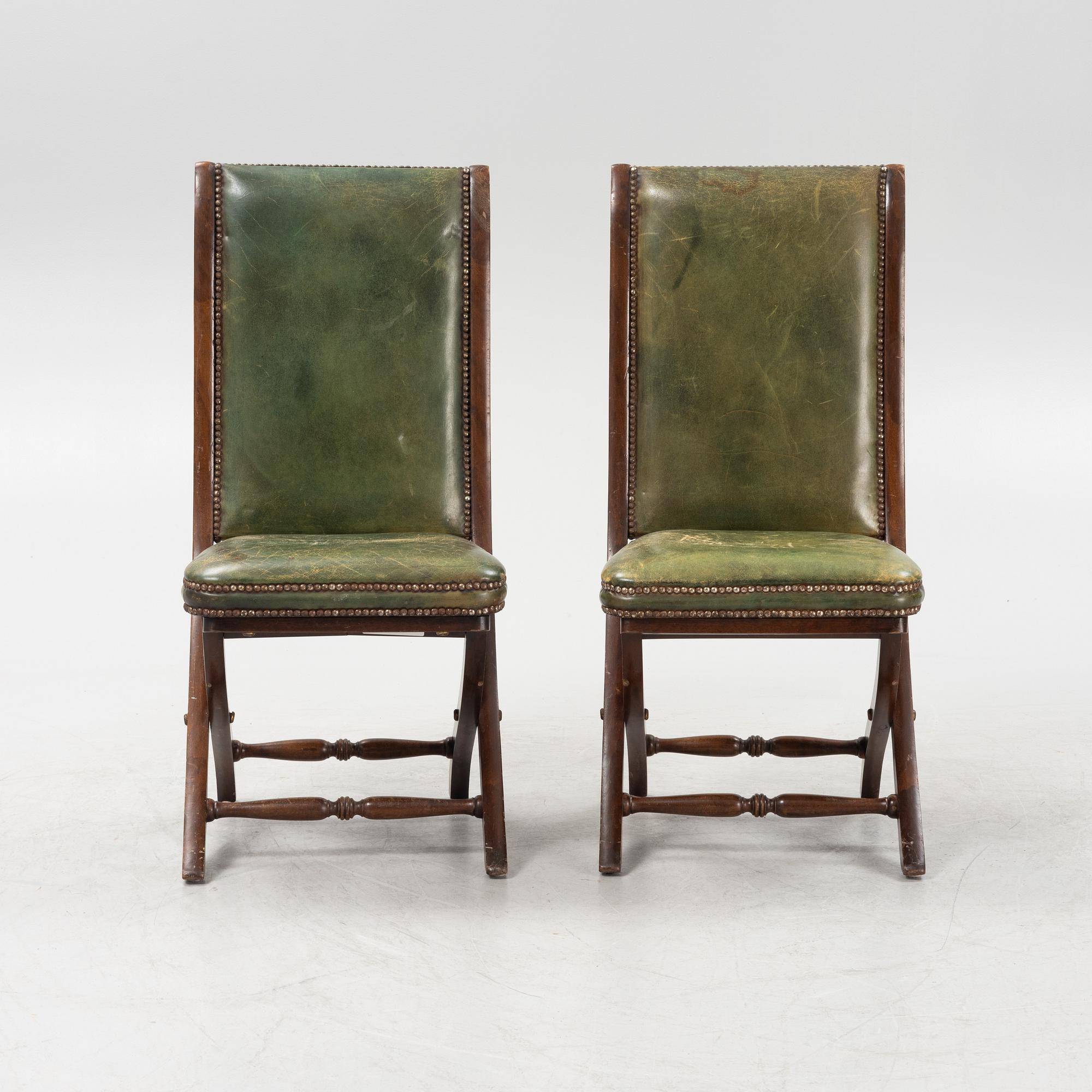 A set of five mahogany and leather upholstered chairs, England, second half of the 20th Century.