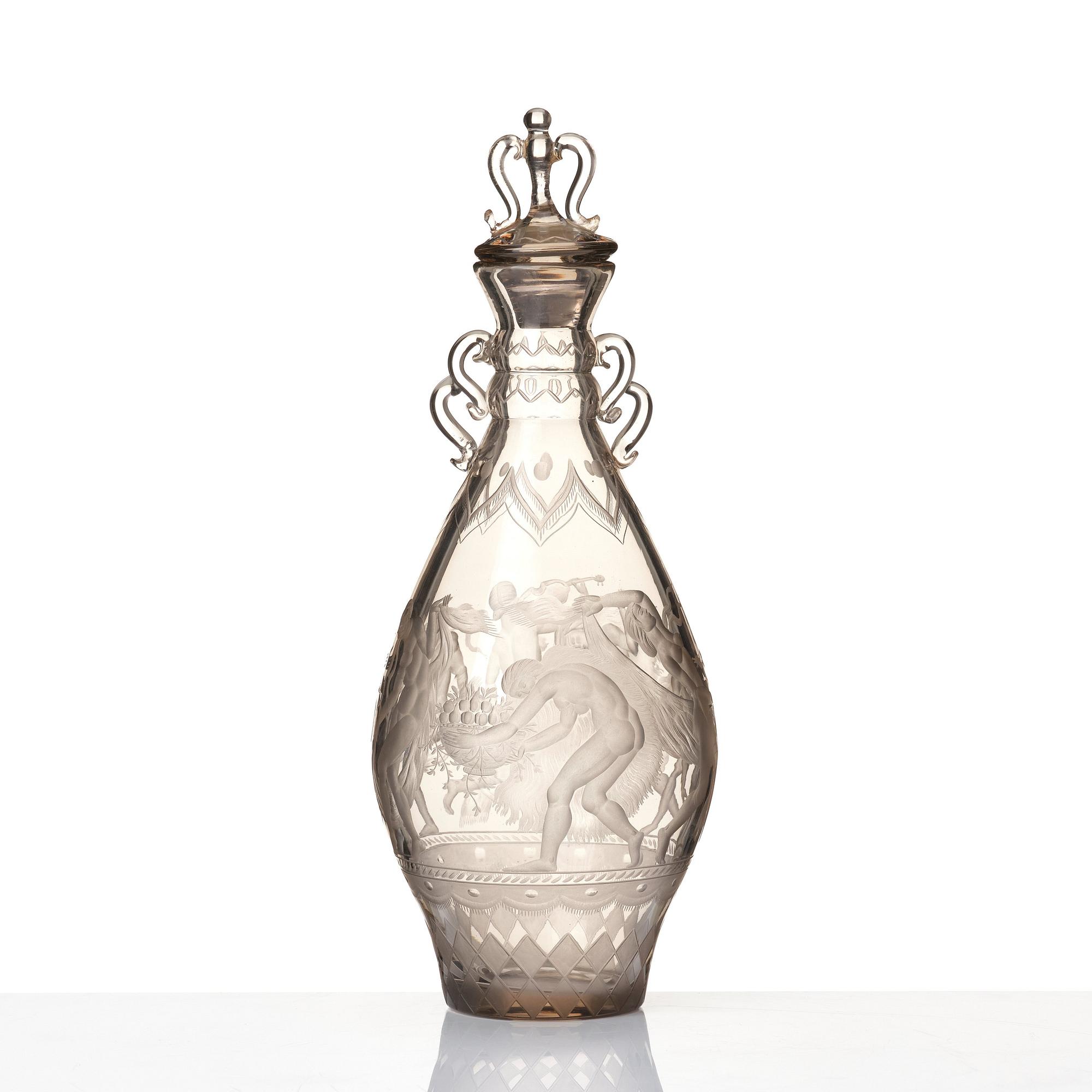 Simon Gate, an engraved glass decanter with stopper, Orrefors 1926, model 234.