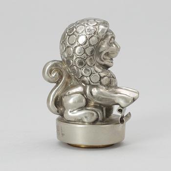 An Anna Petrus pewter and brass seal by Svenskt Tenn 1981.