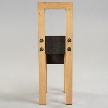 A Jonas Bohlin oak and iron chair 'Sto', executed in Stockholm in 1990,