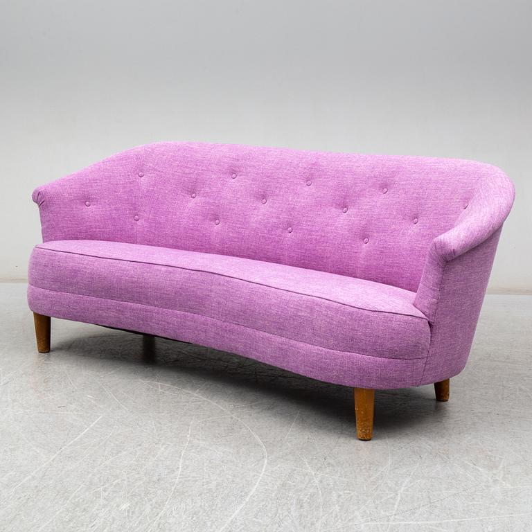 a Carl Malmsten sofa.