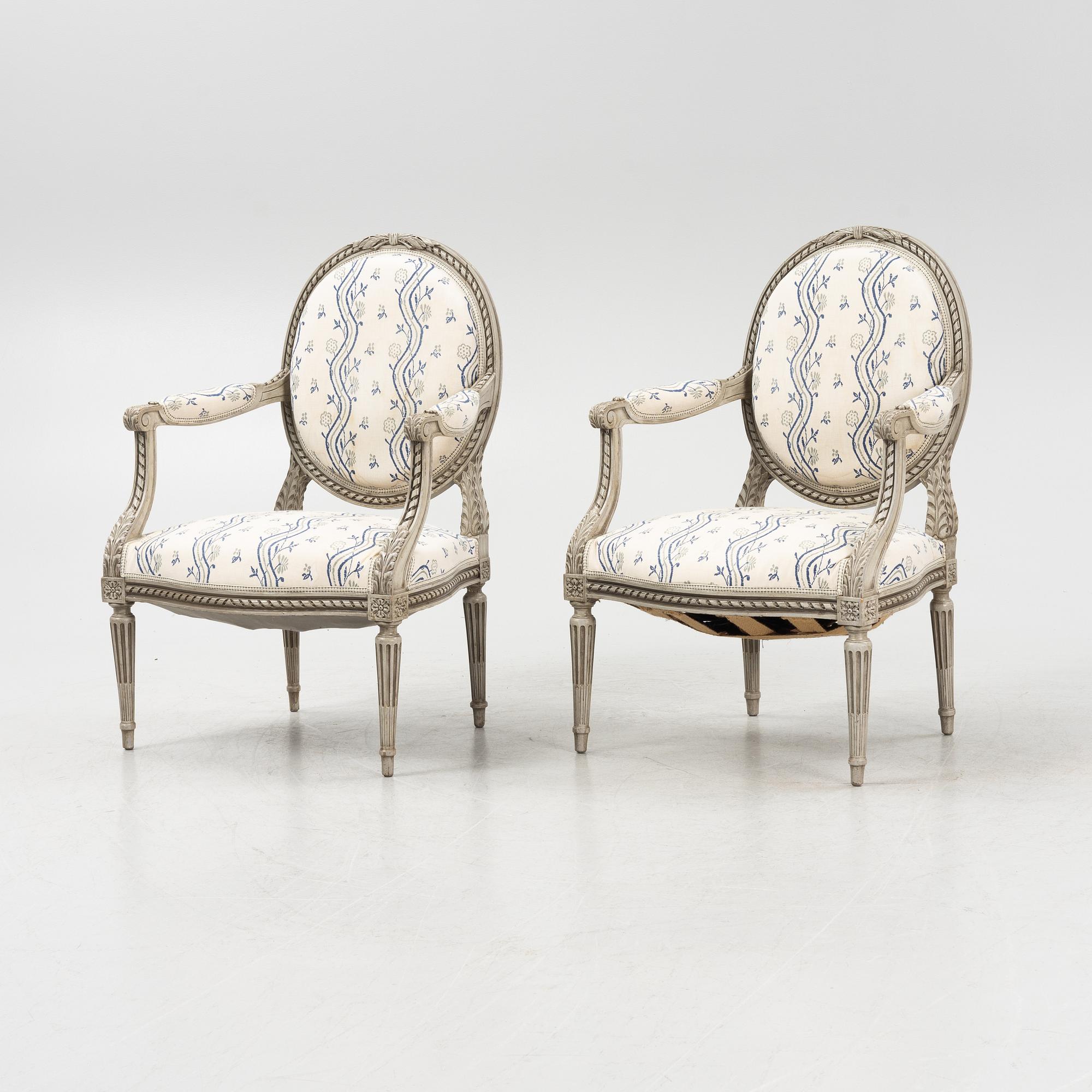 A pair of Gustavian style armchairs, 20th century.