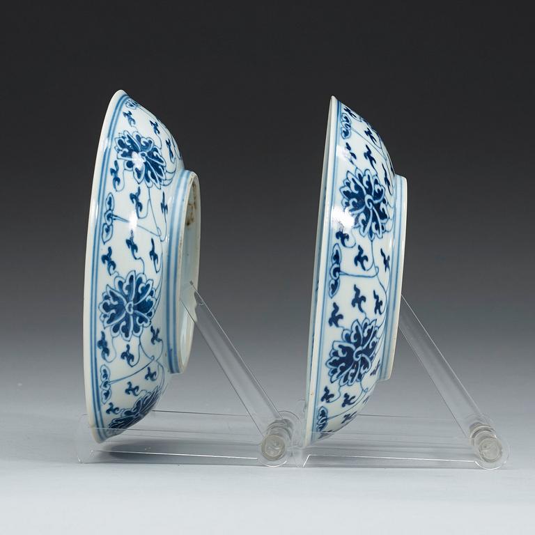 A pair of blue and white lotus dishes, Qing dynasty, Guangxu mark and period (1874-1908).