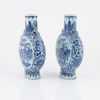 A matched pair of blue and white moon flasks, Qing dynasty, late 19th century.