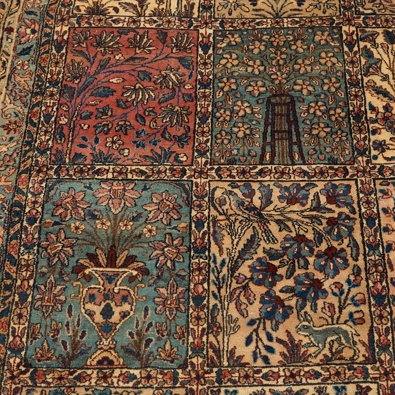 A CARPET. An old Kerman. 521 x 356 cm.