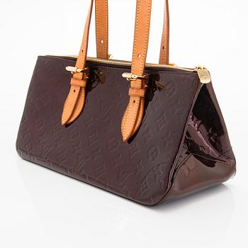 Louis Vuitton, a Vernis 'Rosewood Avenue' bag.